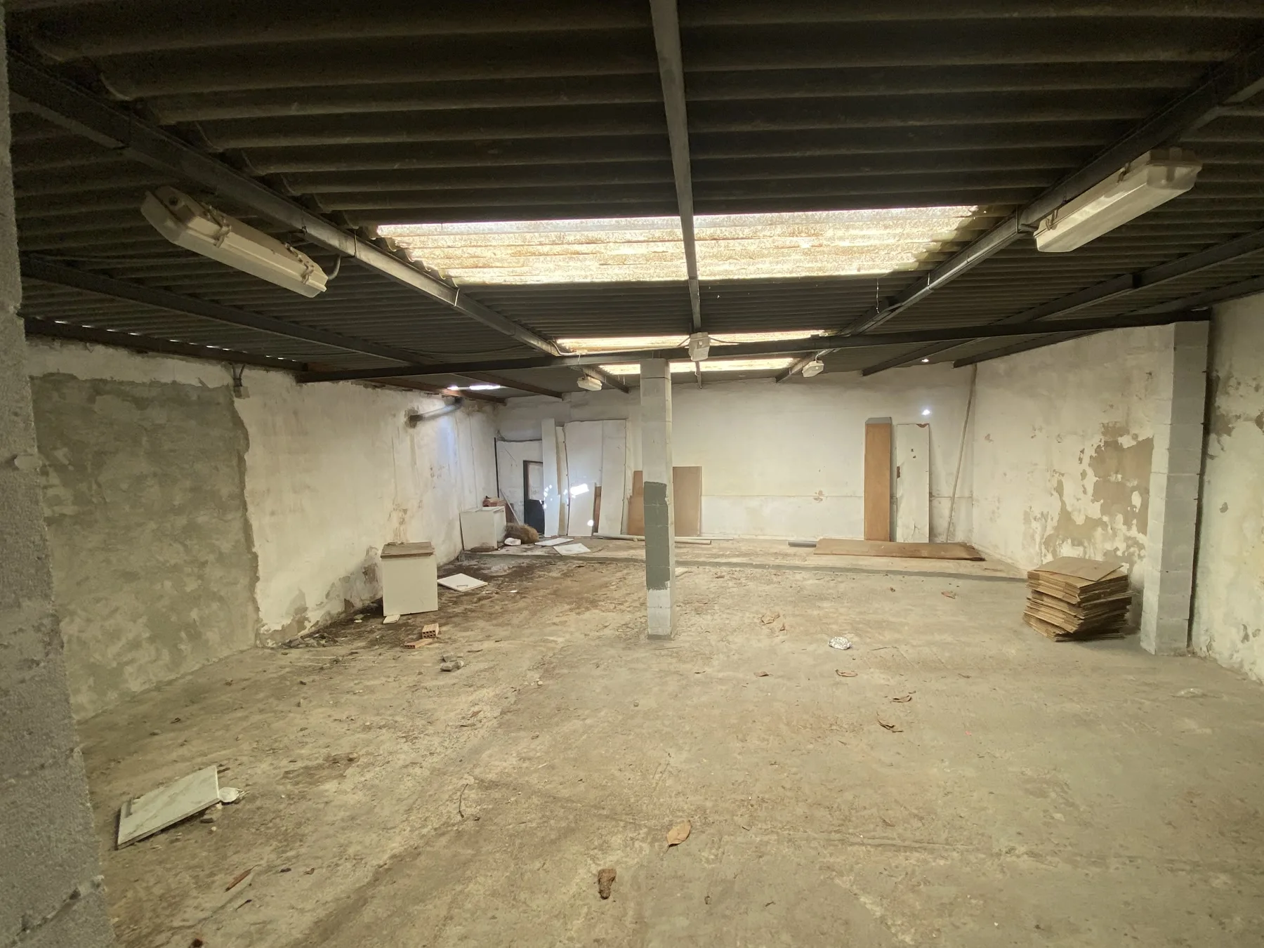 Largely empty interior before renovation